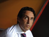Sevilla coach Unai Emery watches on during a game with Atletico Madrid on August 18, 2013