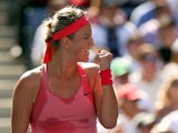 Victoria Azarenka of Belarus reacts during her women's singles semifinal match against Flavia Pennetta of Italy on Day Twelve of the 2013 US Open at USTA Billie Jean King National Tennis Center on September 6, 2013