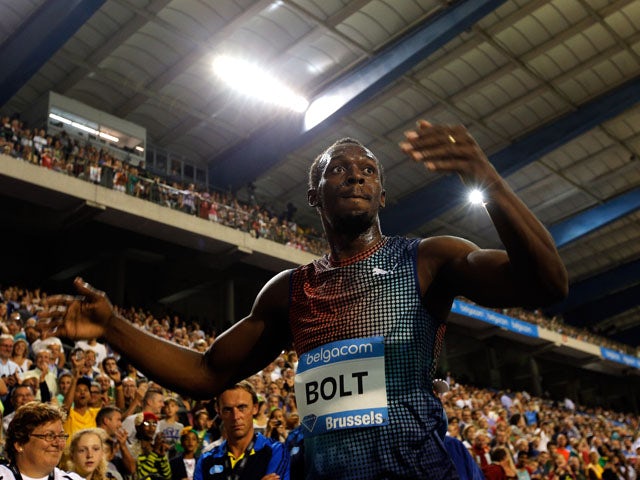 Usain Bolt of Jamaica celebrates winning the 100m final during the 2013 Belgacom Memorial Van Damme IAAF Diamond League meet at The King Baudouin Stadium on September 6, 2013