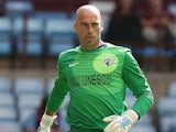 Malaga's Willy Caballero in action during a friendly match against Aston Villa on August 10, 2013