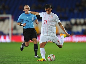 Serbia ease past Wales