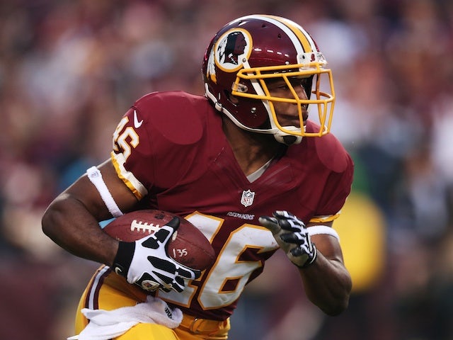 Washington RB Alfred Morris carries the ball against Seattle on January 6, 2013