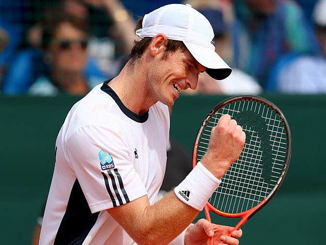 Great Britain's Andy Murray celebrates after beating Croatia's Ivan Dodig during day three of their Davis Cup World Cup play-off tie on September 15, 2013