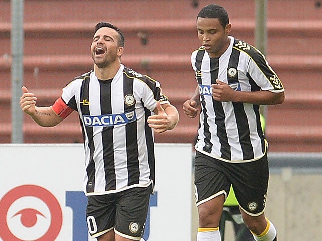 Udinese's Antonio Di Natale celebrates after scoring a late equaliser against Bologna on September 15, 2013