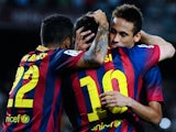 Lionel Messi and Neymar celebrate a goal against Sevilla on September 14, 2013