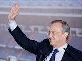 Real Madrid President Florentino Perez waves during a presentation at the Bernabeu on July 13, 2013
