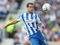 Brighton's Gary Dicker in action against Chelsea during a friendly match on August 4, 2012