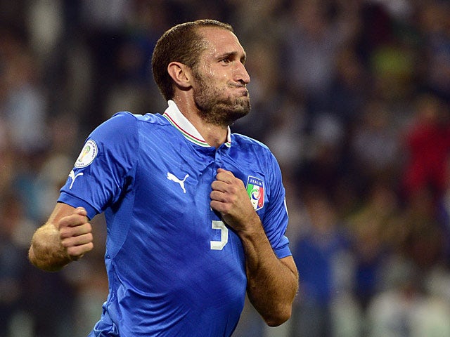 Italy's Giorgio Chiellini celebrates moments after scoring the equaliser against Czech Republic during their World Cup qualifier on September 10, 2013