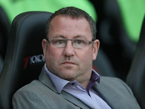 Carlisle United manager Greg Abbott looks on during the League One match between Milton Keynes Dons and Carlisle United at stadium mk on March 27, 2012