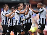 Newcastle players congratulate Hatem Ben Arfa following his goal against Aston Villa on September 14, 2013