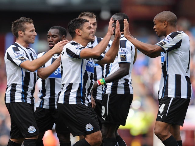 Newcastle players congratulate Hatem Ben Arfa following his goal against Aston Villa on September 14, 2013