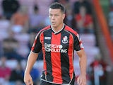 Ian Harte of Bournemouth attacks during the Capital One Cup First Round match between AFC Bournemouth and Portsmouth at The Goldsands Stadium on August 06, 2013 