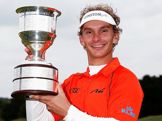 Joost Luiten celebrates with the trophy after winning the KLM Open on September 15, 2013