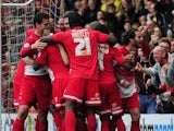 Orient players celebrate a goal by Kevin Lisbie on September 14, 2013