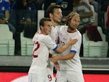 Czech Republic's Libor Kozak is congratulated by team mates after scoring the opening goal against Italy during their World Cup qualifying match on September 10, 2013