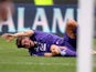 Fiorentina's Mario Gomez picks up an injury during the match against Cagliari on September 15, 2013