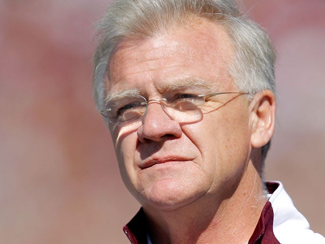 Coach Mike Sherman of the Texas A&M Aggies looks on from the sidelines during a game against the Missouri Tigers at Kyle Field on October 29, 2011
