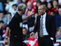 Referee Martin Atkinson has words with Sunderland manager Paolo Di Canio on the touchline during the match against Arsenal on September 14, 2013