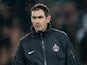 PSG coach Paul Clement leads a warm up prior to the Champions League match against Valencia on March 6, 2013