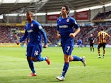 Cardiff's Peter Whittingham celebrates with team mate Fraizer Campbell after scoring the equaliser against Hull on September 14, 2013