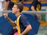Hellas Verona's Raphael Martinho celebrates after scoring the opening goal during the match against Sassuolo on September 15, 2013