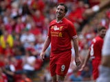 Robbie Fowler of Liverpool in good spirits after a near miss provided by Steven Gerrard during the Steven Gerrard Testimonial Match between Liverpool and Olympiacos at Anfield on August 03, 2013
