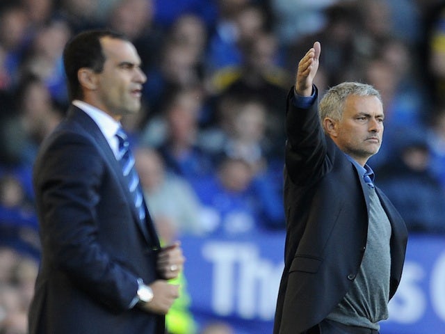 Opposing bosses Roberto Martinez and Jose Mourinho on the touchline during their game on September 14, 2013