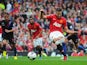 Manchester United's Robin van Persie scores the opener from the penalty spot against Crystal Palace on September 14, 2013