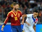 Sergio Ramos of Spain and Alexis Sanchez of Chile compete for the ball during the Spain v Chile international friendly at Stade de Geneve on September 10, 2013