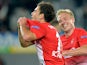 Freiburg's Admir Mehmedi celebrates with team mate Mike Hanke after scoring his team's second goal against Slovan Liberec during their Europa League group match on September 19, 2013