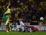 Anthony Pilkington of Norwich City scores his goal during the Capital One Cup second round match between Norwich City and Bury at Carrow Road on August 27, 2013