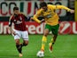 Milan's Antonio Nocerino and Celtic's Giorgios Samaras battle for the ball during their Champions League group match on September 18, 2013