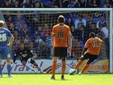 Wolves' Bakary Sako scores a penalty against Shrewsbury during their League One match on September 21, 2013