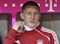 Bayern Munich's Bastian Schweinsteiger sits on the bench during a game with Hoffenheim on March 10, 2012