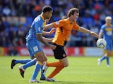 Shrewsbury Town's Connor Goldson and Wolves' Bjorn Sigurdarson battle for the ball during their League One match on September 21, 2013
