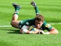 Leicester Tigers' Blaine Scully dives in to score a try against Newcastle Falcons during their Aviva Premiership match on September 21, 2013