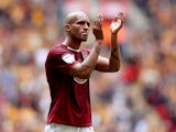 Clarke Carlisle looks dejected after defeat during the npower League Two Play Off Final between Bradford City and Northampton Town at Wembley Stadium on May 18, 2013