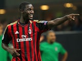 Milan's Cristian Zapata celebrates after scoring the opening goal against Celtic during their Champions League group match on September 18, 2013