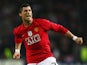 Cristiano Ronaldo of Manchester United celebrates victory after the UEFA Champions League Quarter Final second leg match between FC Porto and Manchester United at the Estadio do Dragao on April 15, 2009