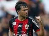 Nice's Dario Cvitanich celebrates after scoring the opening goal against Valenciennes during their Ligue 1 match on September 22, 2013