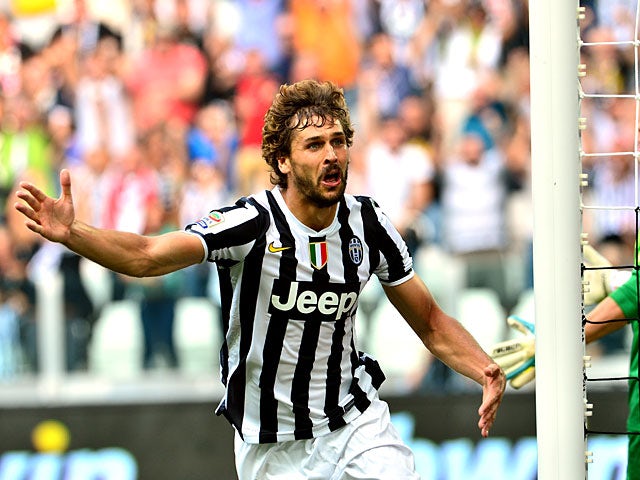 Juventus' Fernando Llorente celebrates after scoring his team's second goal against Hellas Verona during their Serie A match on September 22, 2013
