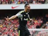 Stoke's Geoff Cameron celebrates after scoring the equaliser against Arsenal during their Premier League match on September 22, 2013