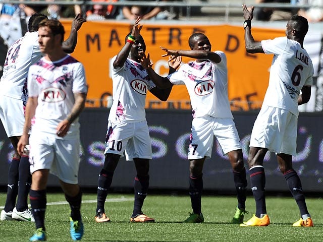 Bordeaux's Henri Saivet celebrates with teammates after scoring his team's third goal against Lorient during their Ligue 1 match on September 22, 2013