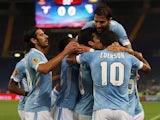 Lazio's Hernanes is congratulated by team mates after scoring the opening goal against Legia Warszawa during their Europa League group match on September 19, 2013