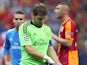 Real Madrid 'keeper Iker Casillas leaves the field injured against Galatasaray on September 17, 2013