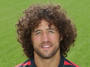 Jacques Burger of Saracens poses for a portrait at the photocall held at Allianz Park on August 6, 2013