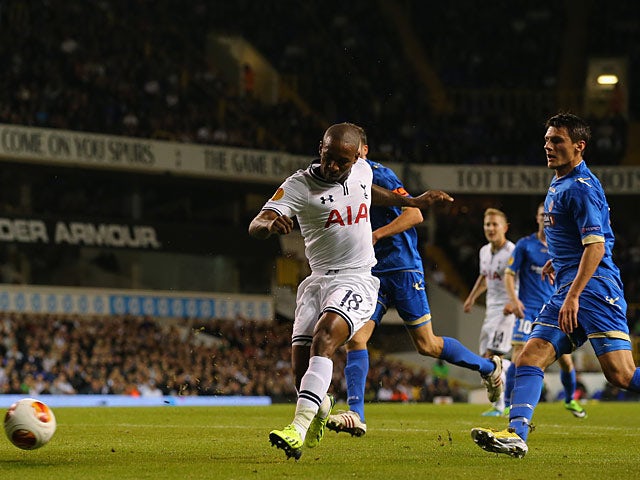 Tottenham's Jermain Defoe scores his team's second goal against Tromso IL during their Europa League group match on September 19, 2013