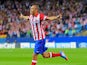 Atletico Madrid's Joao Miranda celebrates after scoring the opening goal against Zenit during their Champions League group match on September 18, 2013