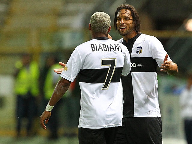 Parma's Jonathan Biabiany is congratulated by team mate Amauri Carvalho De Oliveira after scoring the opening goal against Roma on September 16, 2013