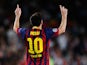 Barcelona's Lionel Messi celebrates after scoring the his team's second goal against Ajax during their Champions League group match on September 18, 2013